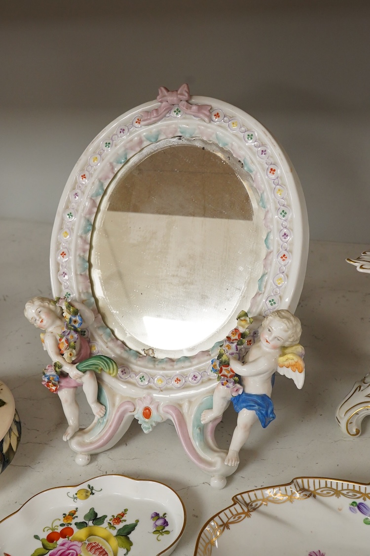 A collection of Beswick and Royal Albert Beatrix Potter figures to include Little Black Rabbit and The Head Gardener, together with two plates, 19cm wide